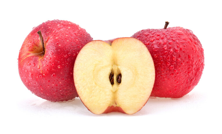 pink lady apples with water drops isolated on white background